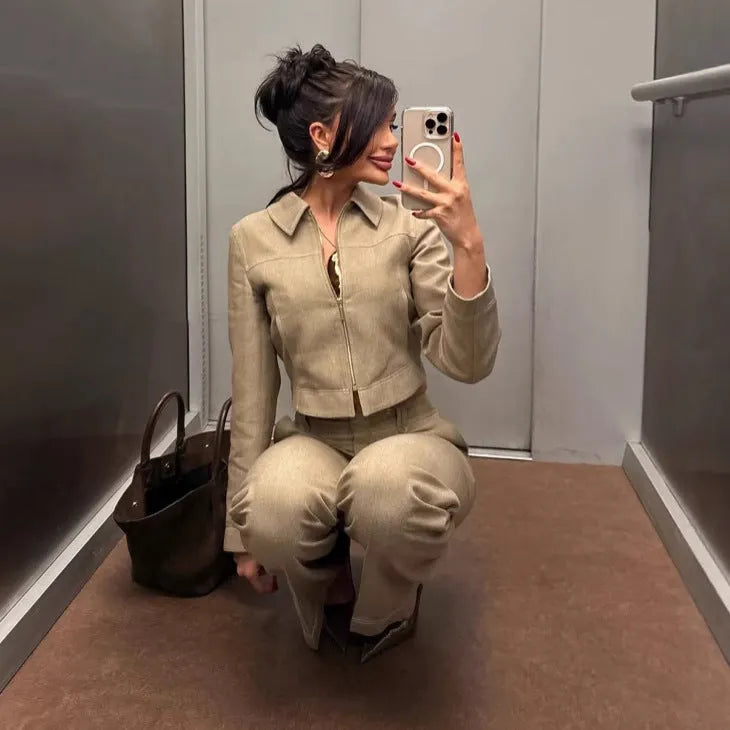 Women's herringbone pattern suit set with 3D embroidery, showing the long-sleeve coat and straight-leg trousers.