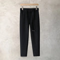 Boys slim straight wool trousers in tapered fit, shown in light grey colour.