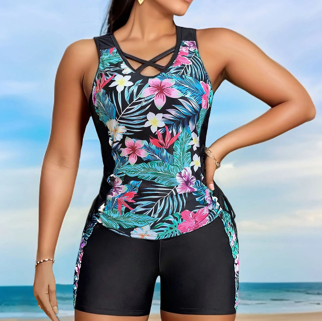 Women's plus size floral print high-waisted bikini swimsuit in navy blue.