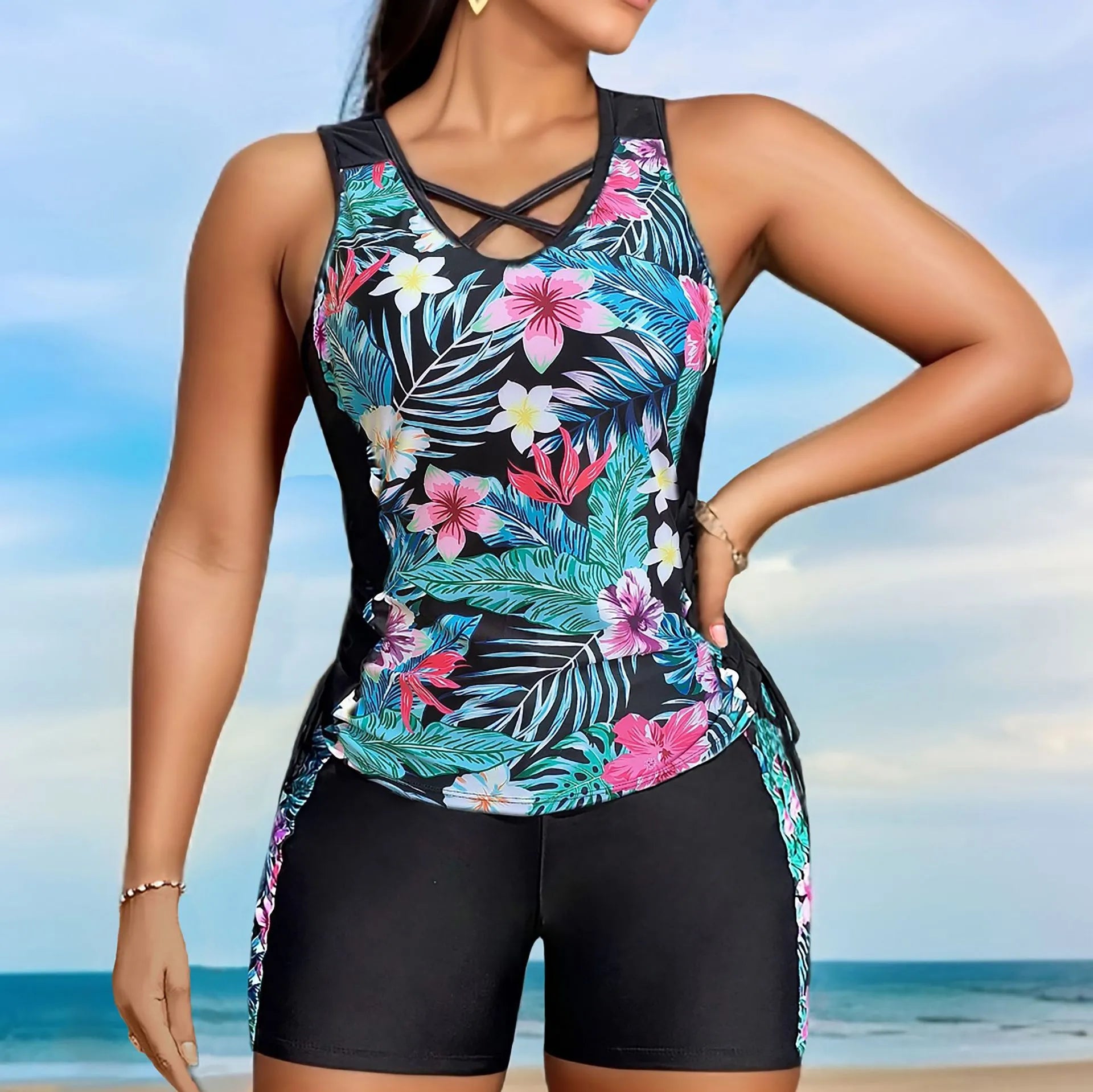 Women's plus size floral print high-waisted bikini swimsuit in navy blue.