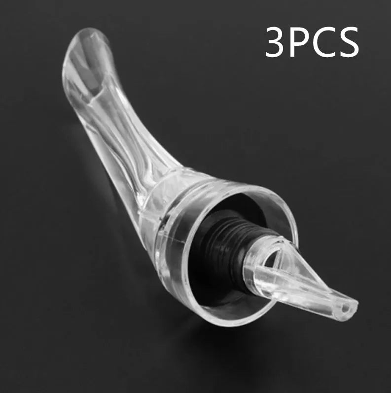A clear acrylic wine aerator with a stainless steel filter, measuring 16cm long.