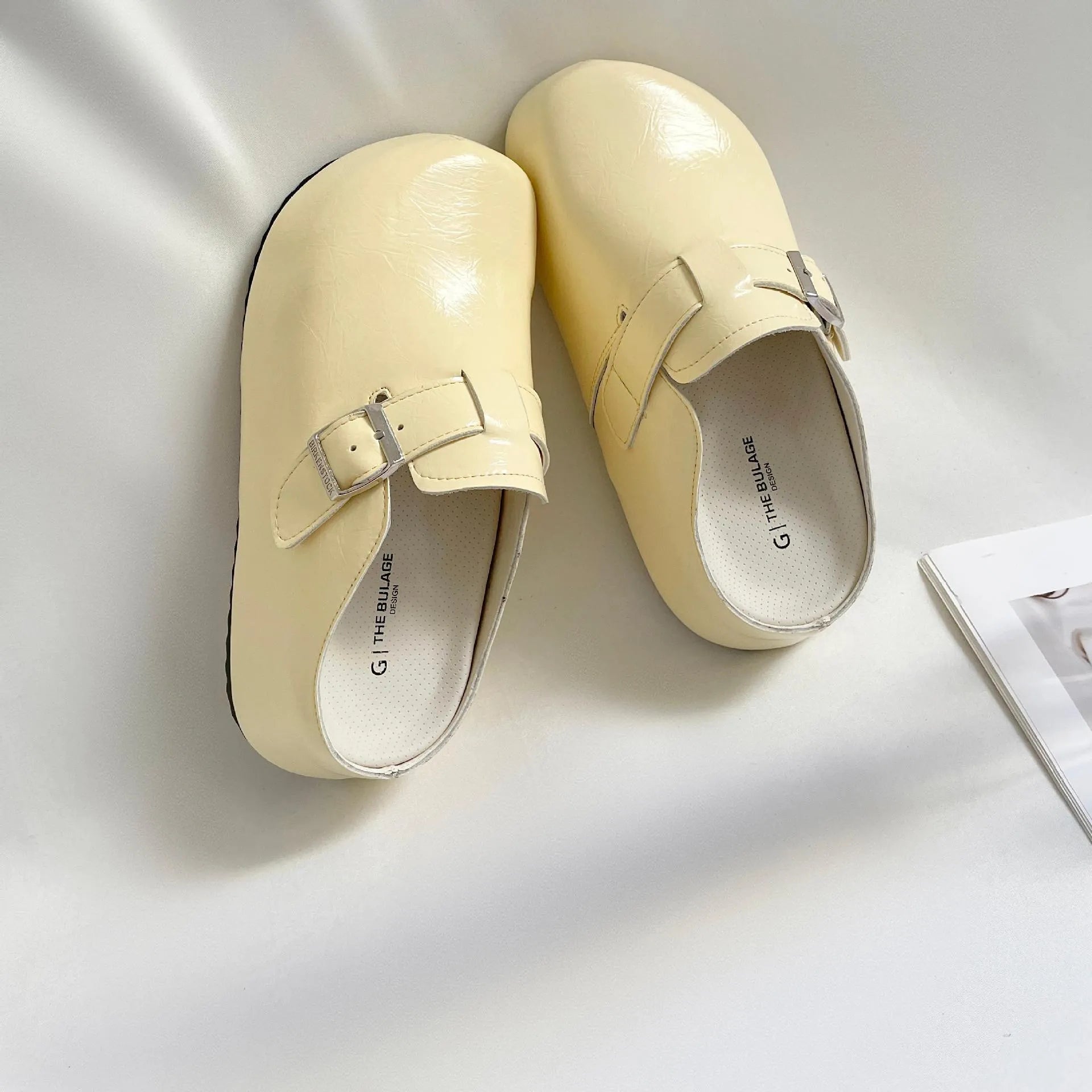 Flat buckle casual sneakers with round toe in yellow, creamy-white, silver, and black colour options