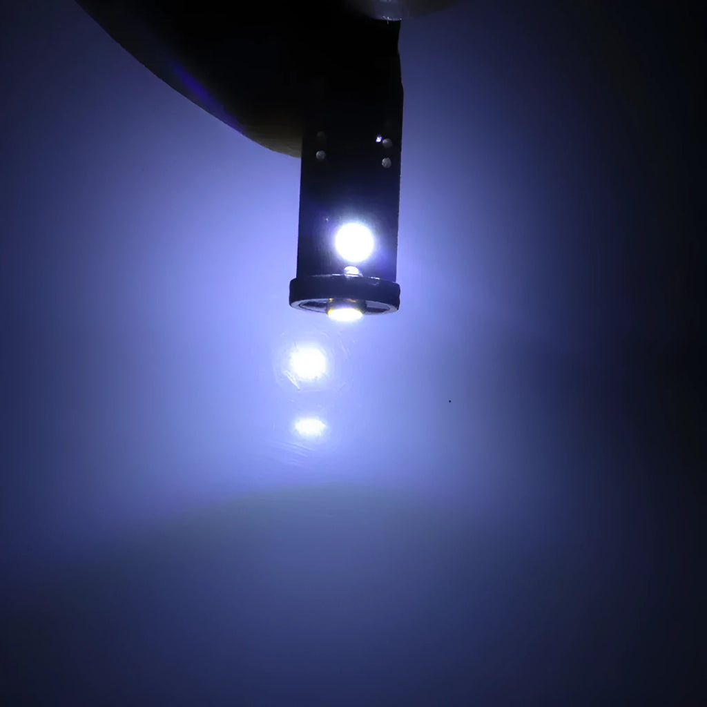 T10 W5W LED car light with blackboard white finish and compact 23mm x 9mm dimensions