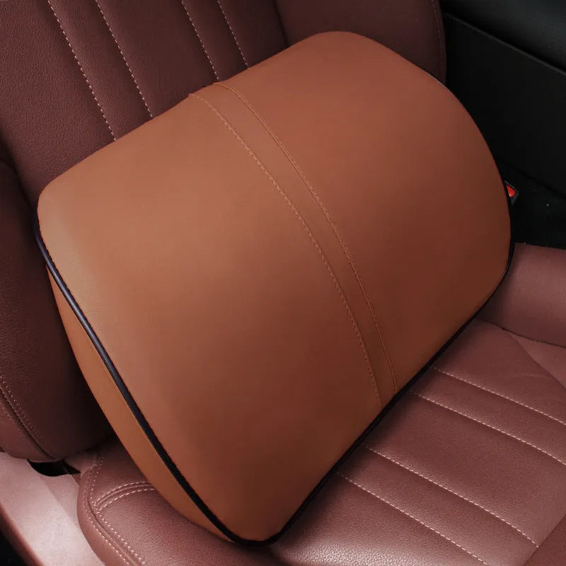 Memory foam car headrest with leather exterior in solid colour options