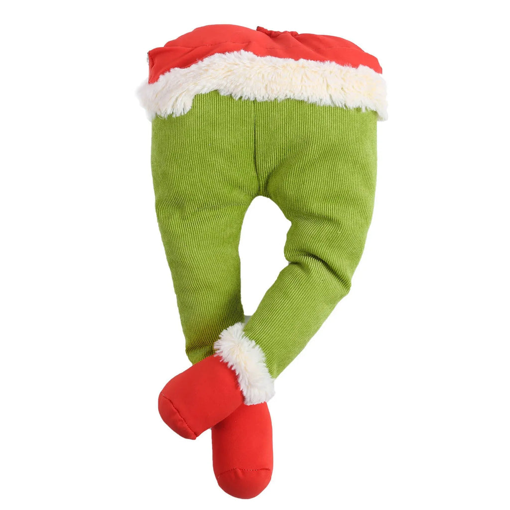 Two white fabric elf legs decorating a Christmas garden display, overall length 38cm