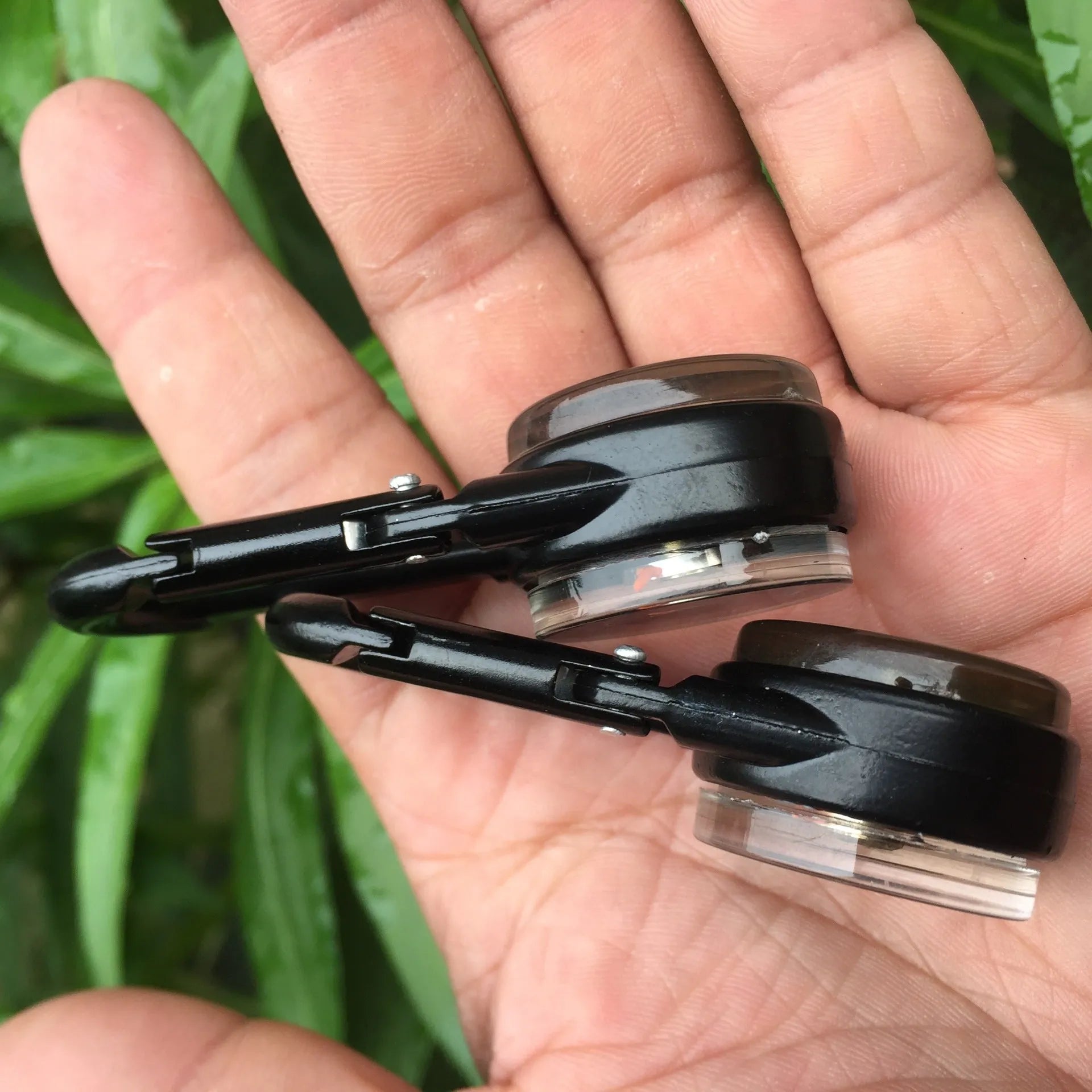 Black Army Green rose gold zinc alloy camping carabiner with thermometer and compass display, shown from the side.