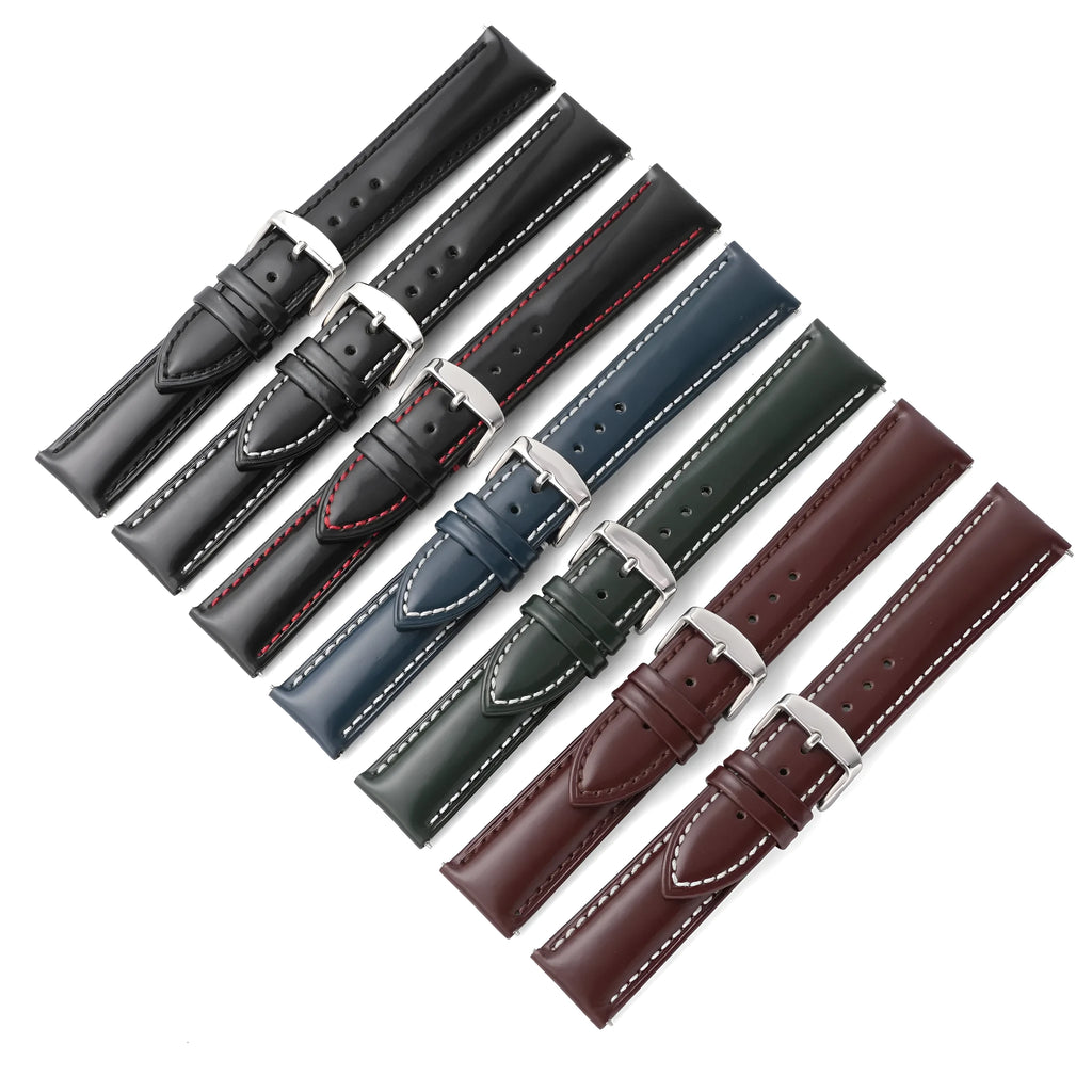 Quick-release leather watch strap in cowhide, shown in black with white stripe detail