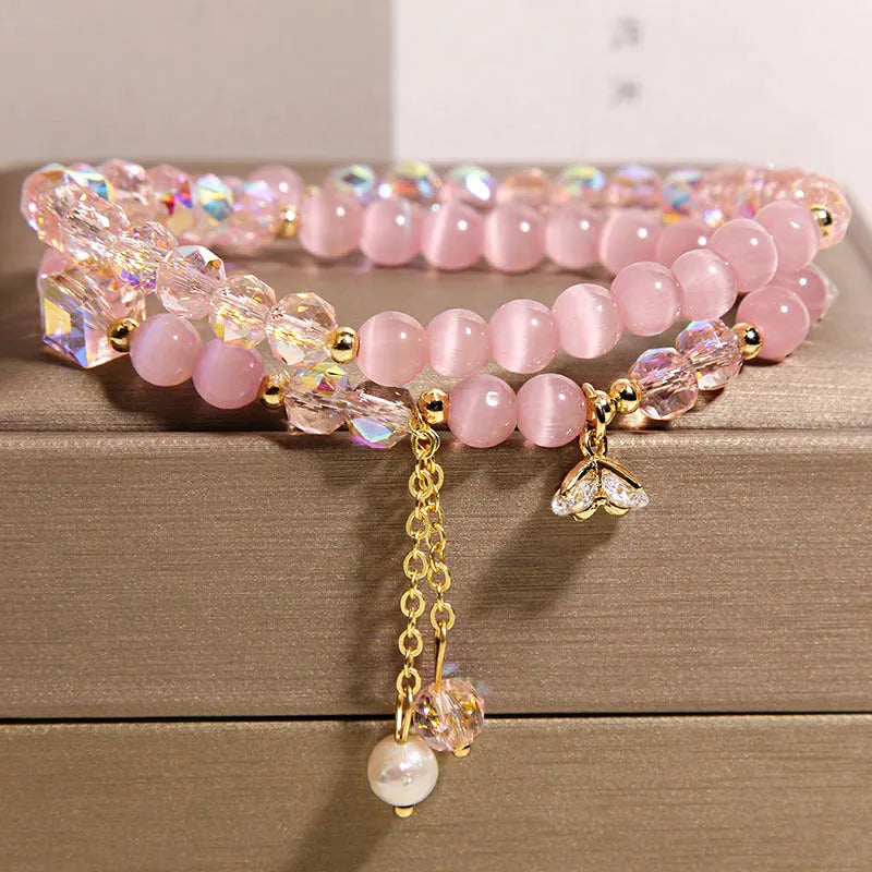 New Chinese style gold-plated double ring bracelet with pink cat eye crystal and zircon small flower detail