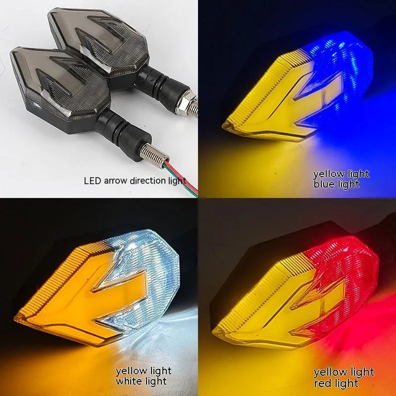 Arrow-shaped LED motorcycle turn signal light unit for 12V vehicles, shown in available colour options.