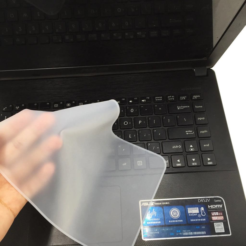 Transparent silicone laptop keyboard dust film on a notebook close-up