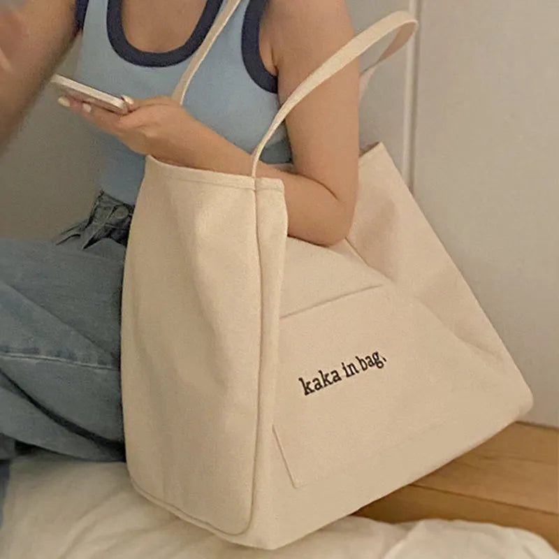 Large capacity canvas shopping tote bag in solid colour, suitable for shoulder carry