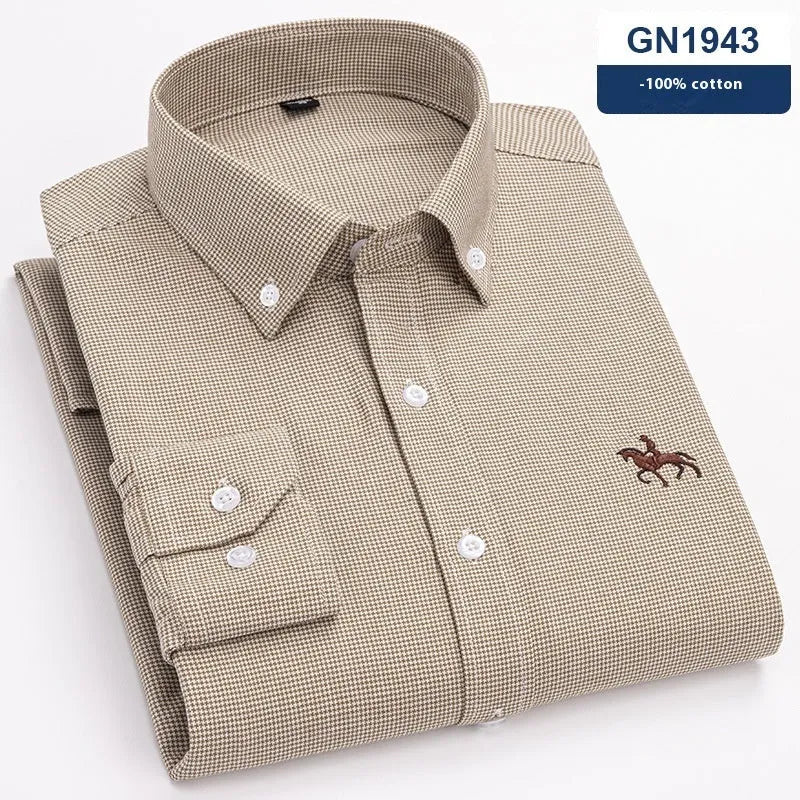 A man wearing a pure cotton Oxford button-down shirt in a casual style.
