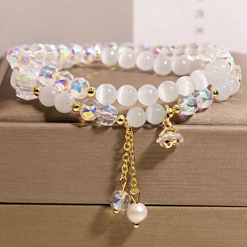 New Chinese style gold-plated double ring bracelet with pink cat eye crystal and zircon small flower detail