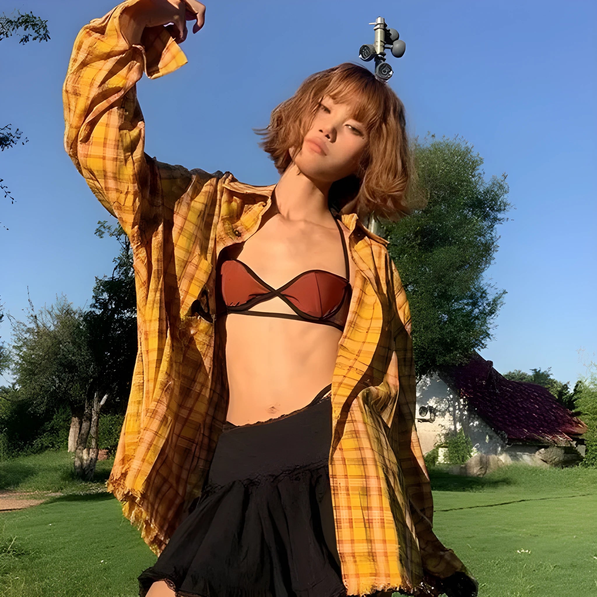 Dopamine Yellow and black plaid pattern on a loose-fitting unisex cardigan-style shirt.
