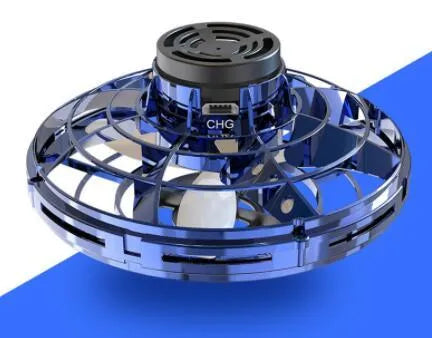 Blue rotating flying gyro induction drone toy made of plastic, 4x8cm, held in hand showing its compact size