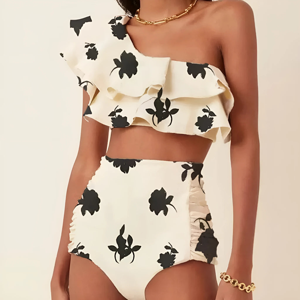 Women's printed bikini with oblique shoulder straps and high-waist briefs in multiple colours