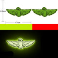 Pair of reflective warning stickers with dragon design, each measuring 9 by 5 centimetres.