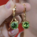 Gold grey geometric round ring earrings with rhinestone detail for women, one pair