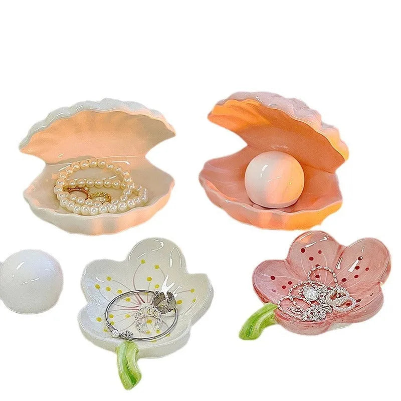 White porcelain storage tray with optional small integrated LED night light, shown in pink and white colour options.