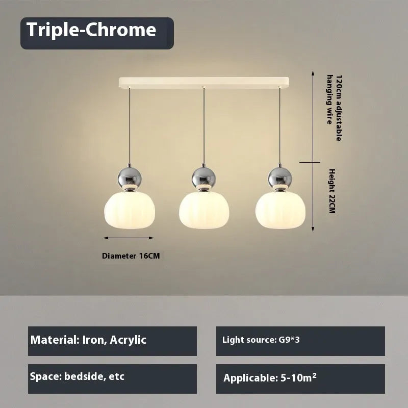 Nordic style pumpkin-shaped alloy chandelier hanging from a ceiling, available in single or three-head models.