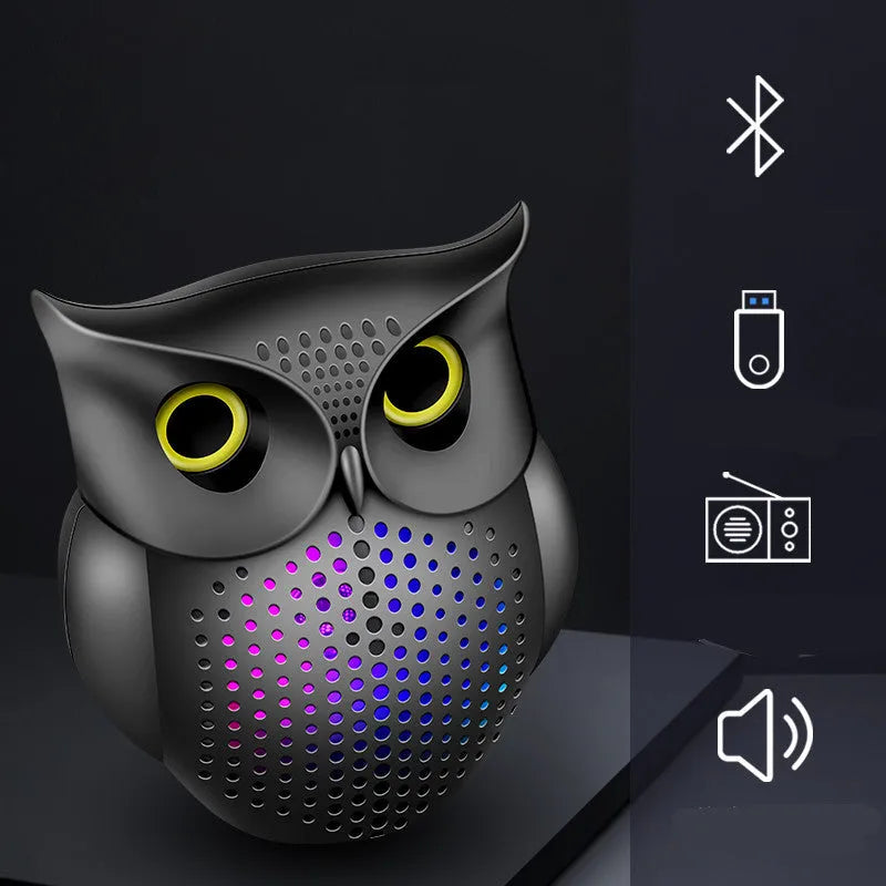 Black wireless Bluetooth speaker with cartoon owl design measuring 4 inches