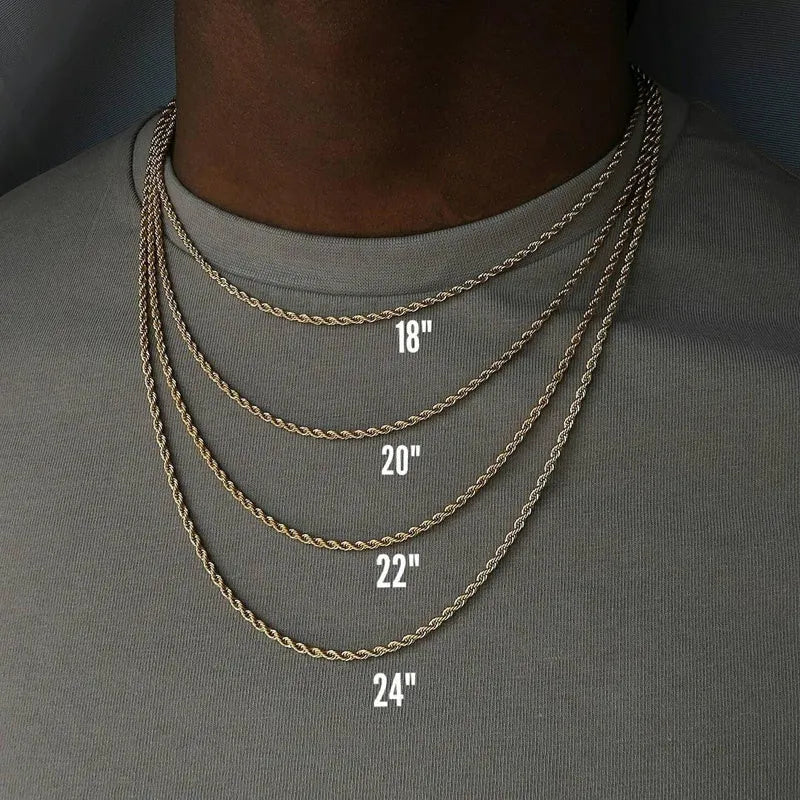 Less steel Figaro Cuban chain necklace in silver on white background showing links and clasp