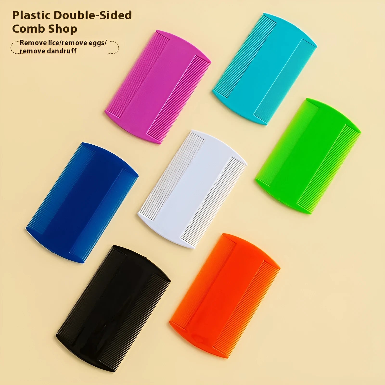 Close-up of a double-edged fine-tooth lice comb with coloured plastic handle and metal teeth.