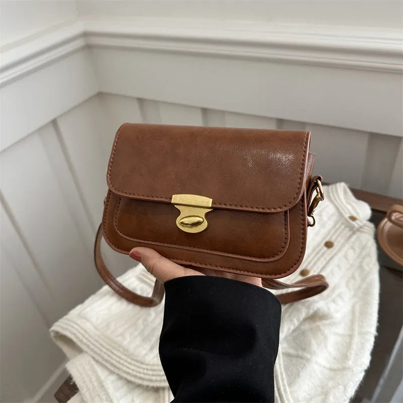 Soft PU leather horizontal square handbag in retro style showing four colour options
