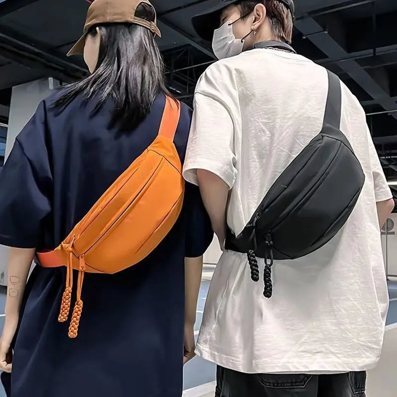 Men's black polyester chest bag shown as a crossbody bag with 35cm width