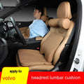 Volvo car headrest, neck pillow, and lumbar support cushion set in a minimalist design on a car seat