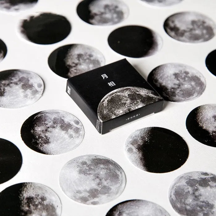 Boxed set of 45 black moon phase and calendar planet hand account stickers.