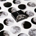 Boxed set of 45 black moon phase and calendar planet hand account stickers.