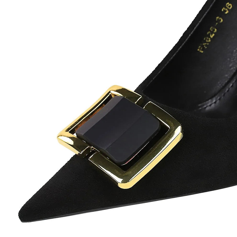 Black suede women's stiletto high heels with a 9cm heel and pointed toe on a plain background.