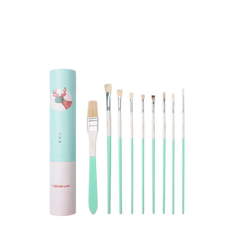 Acrylic gouache painting brush set with fan brushes, liner, and corner tools in animal designs on a table