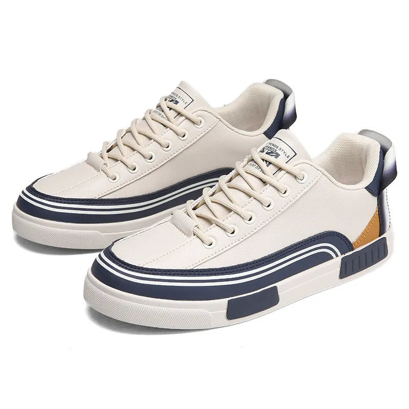 Men's beige, white and green canvas casual shoes with mesh panels and flat heel.
