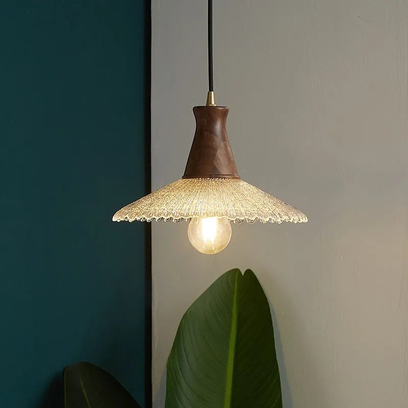 Retro brass and glass woodcraft chandelier ceiling lamp on a white background.