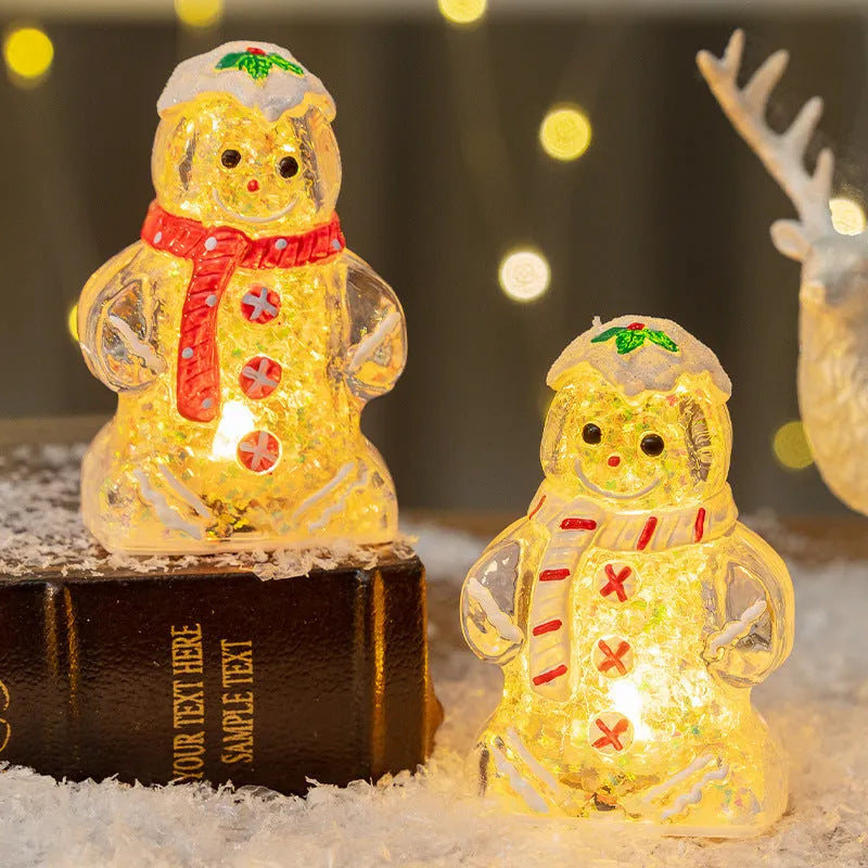 Glowing LED Christmas gingerbread man and snowman ornaments with removable scarves in different colours.