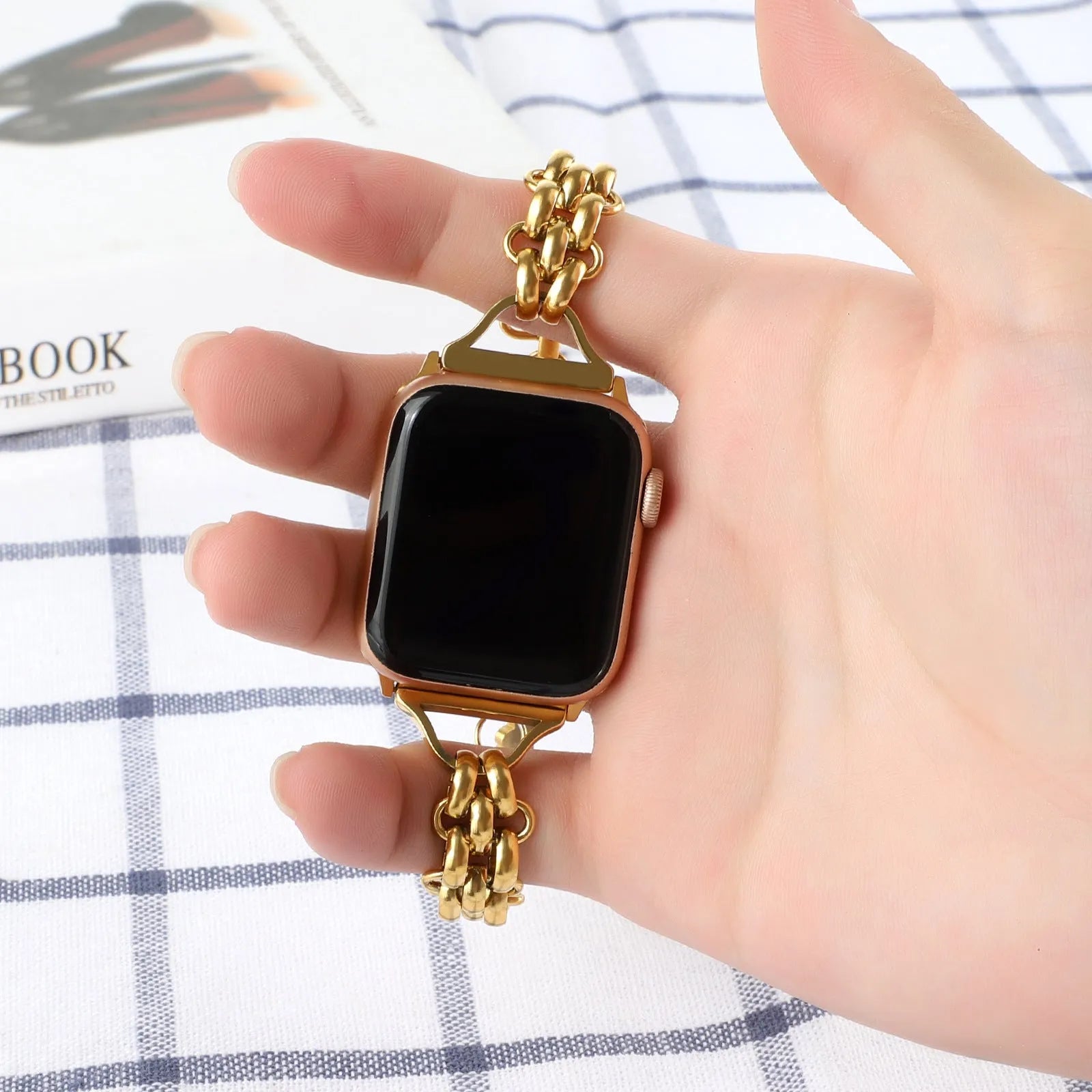 Stainless steel double row chain watch band for Apple Watch in silver on sport-style background