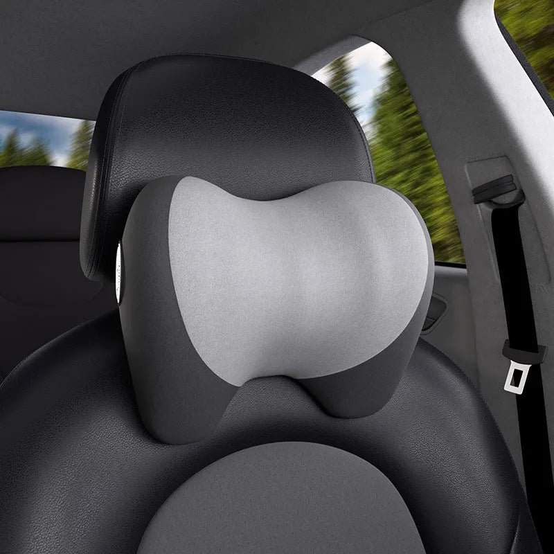 Automotive headrest neck pillow with memory foam filler and nylon knitted fabric cover, shown in apricot gray and pure black.