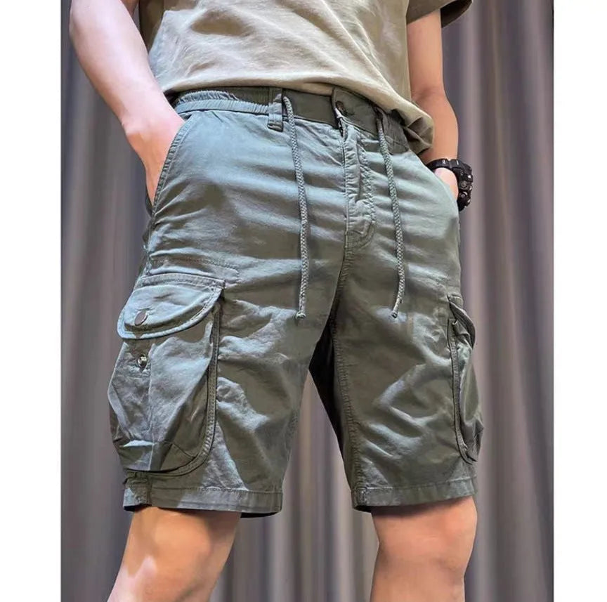 Korean style loose straight-leg casual overalls trousers with multiple pockets in khaki colour.
