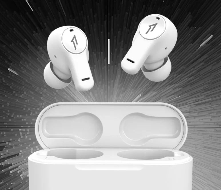 Pearl white and black true wireless Bluetooth sports headphones with USB charging cable.