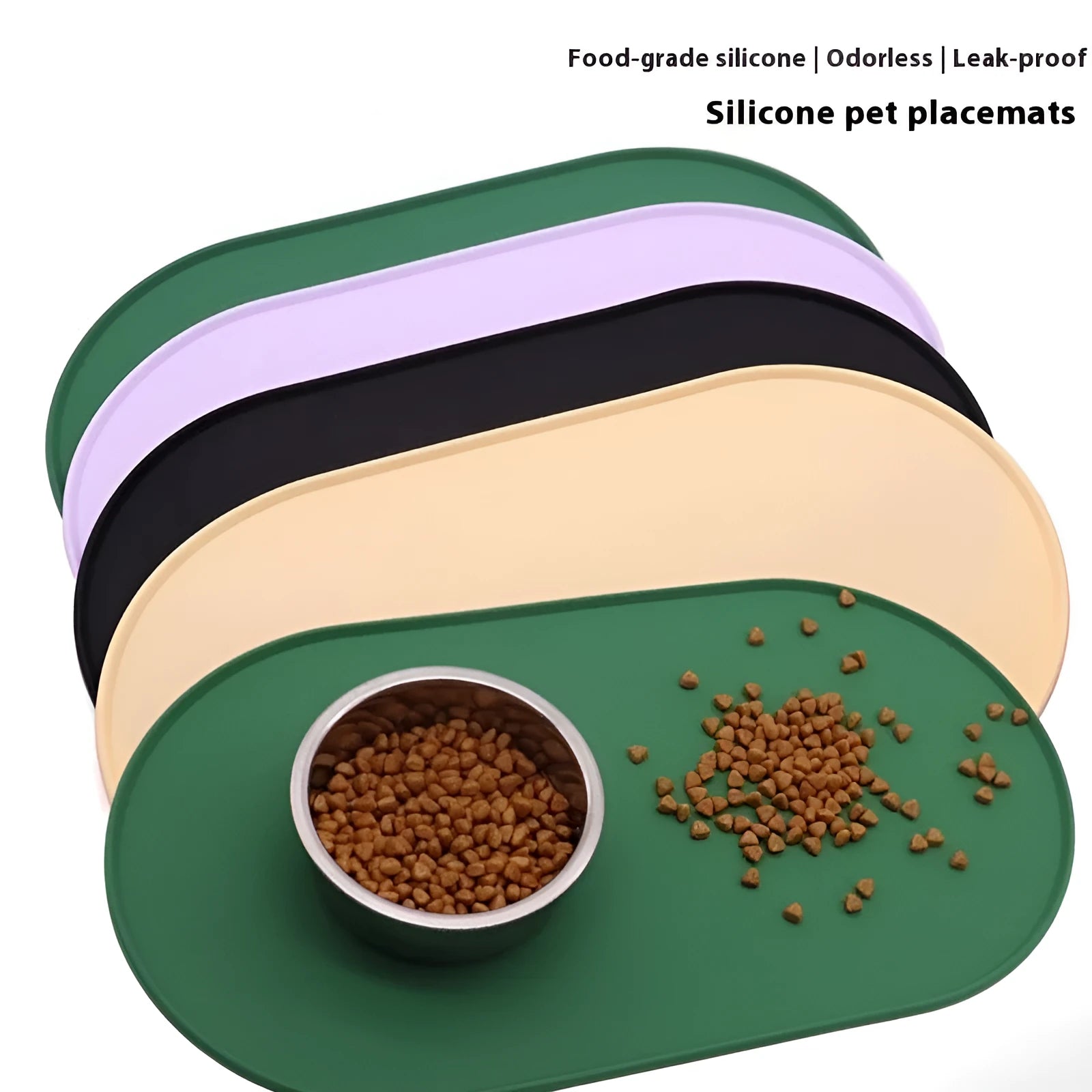 Beige silicone cat feeding mat with raised edge containing a food bowl and scattered kibble on a kitchen floor.