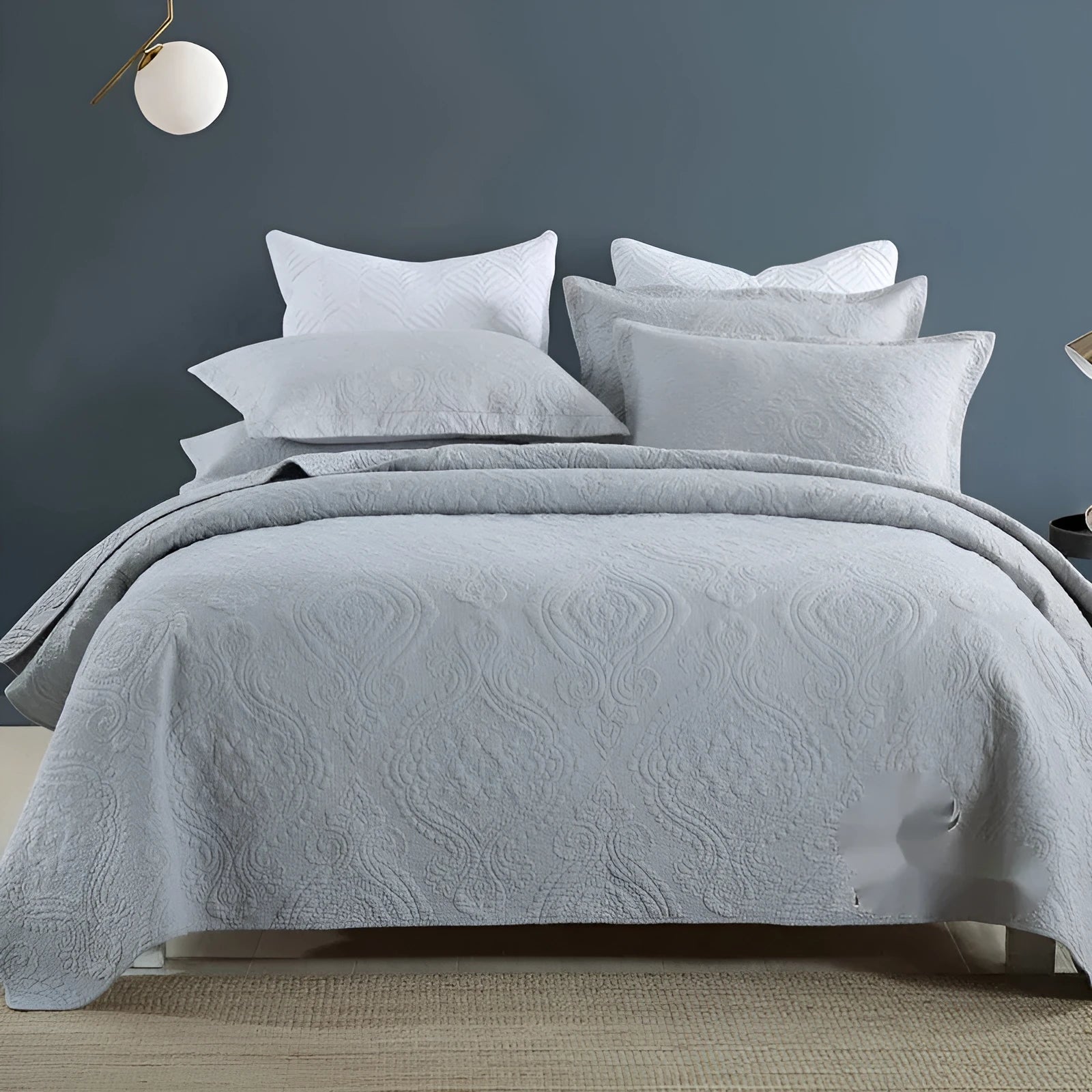 Double-sided pure cotton bed cover three-piece set in a light grey damascus pattern on a bed.