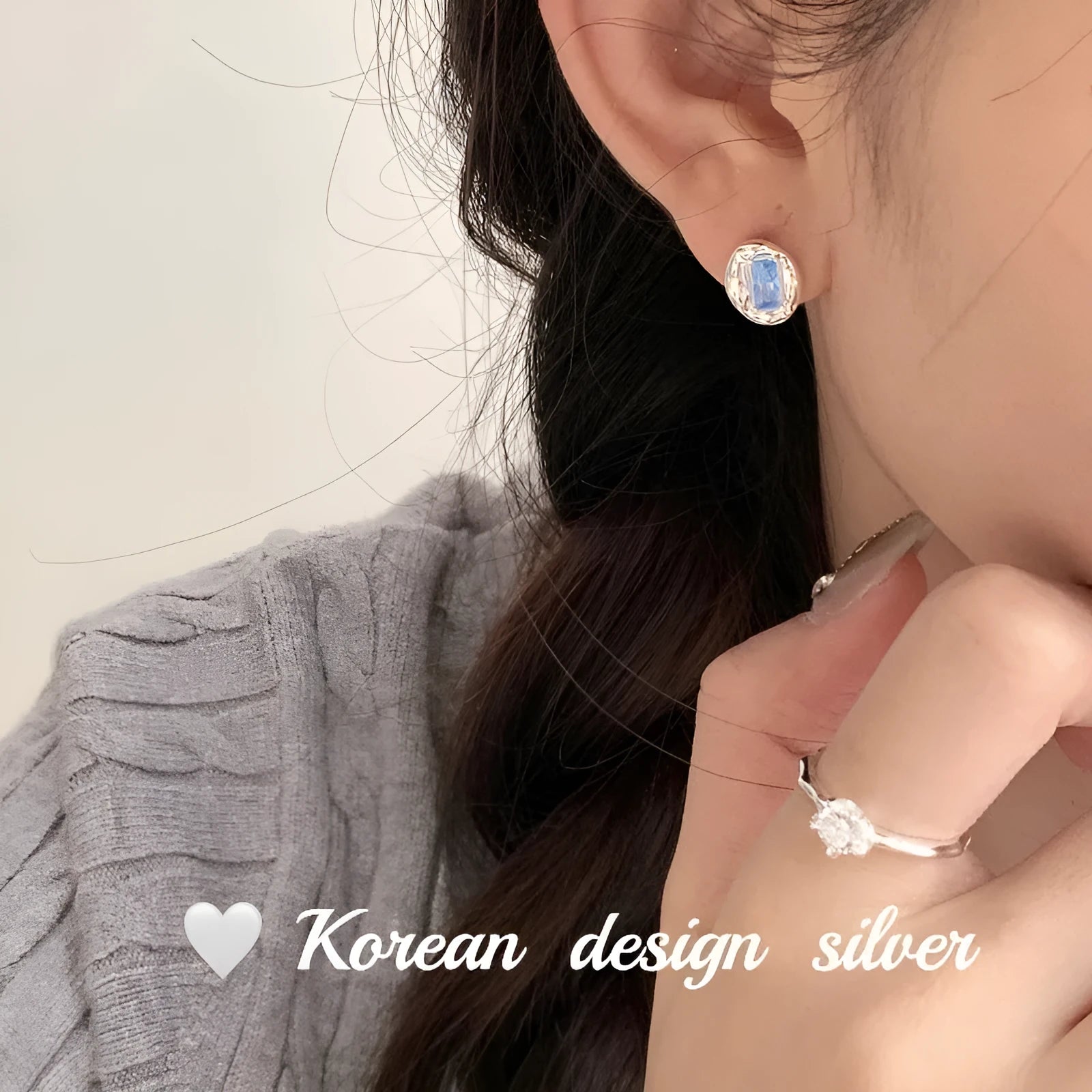 S925 sterling silver oval blue diamond heart-wrapped geometric earrings with electroplated silver finish