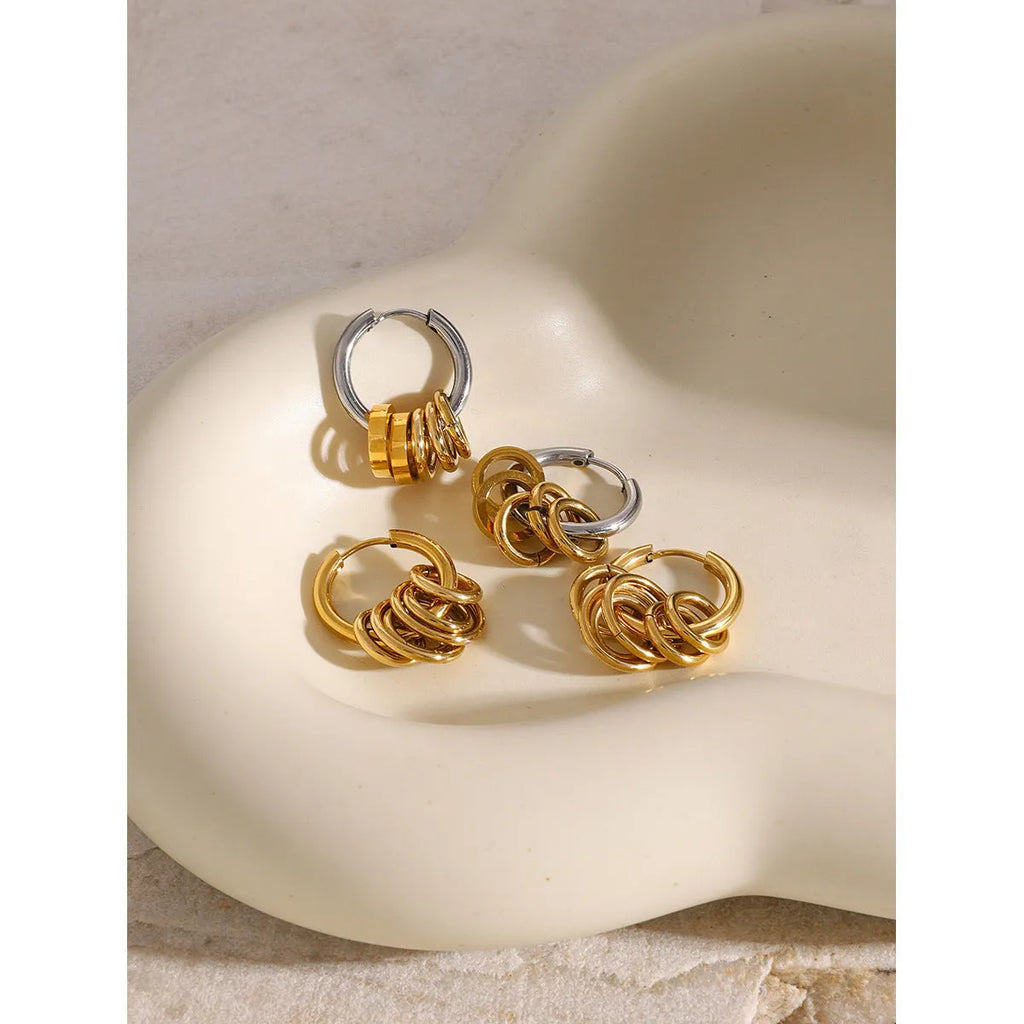 A pair of modern stainless steel earrings with an electroplated colour finish in a unisex ins style.