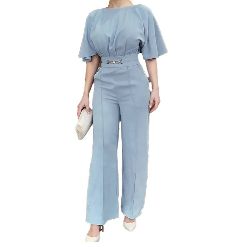 Blue polyester men's suit with long-sleeve jacket and trousers on a hanger.