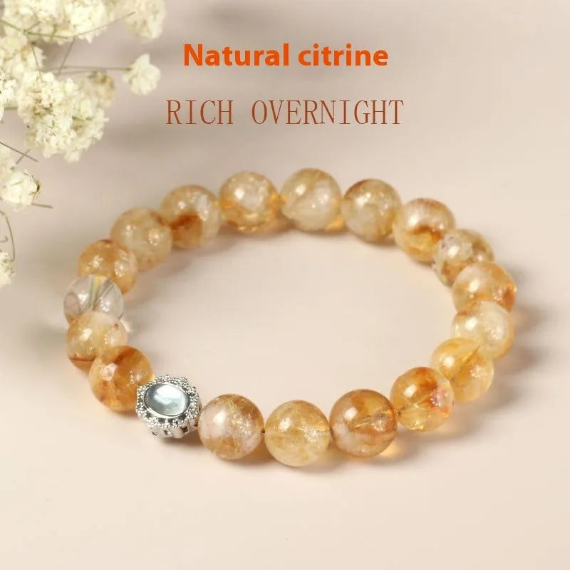Citrine crystal bracelet with 10mm geometric shapes on wrist.