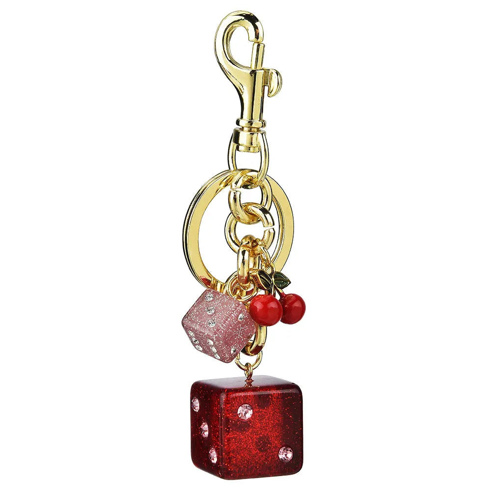 Square cherry red and silver dice pattern metal keychain pendant on a key ring