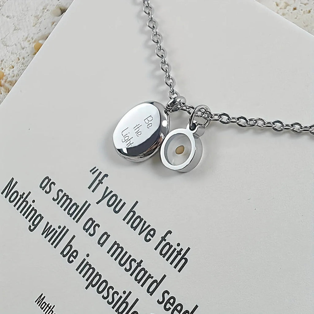 Stainless steel mustard seed faith pendant necklace on adjustable chain, silver colour, geometric shape with drip oil finish