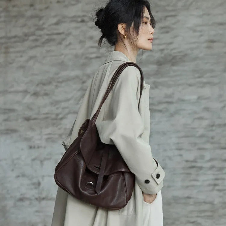 Vegetable-tanned leather retro crossbody tote bag in coffee, elephant gray, caramel or black, large or medium, with inner patch pocket.